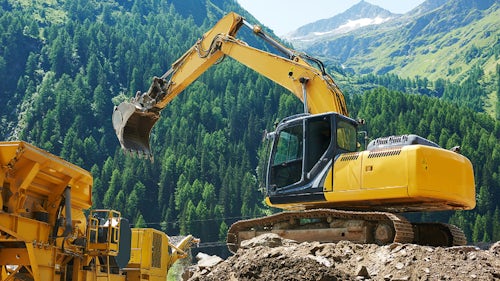 Heavy equipment working in forest